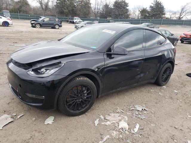TESLA MODEL Y 2021 with VIN 5YJYGAEE1MF199950 - Photo from auction