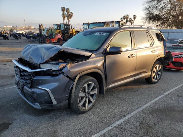 Photo 2 from auction – 2023 HONDA PILOT TOUR with VIN 5FNYG2H76PB015285
