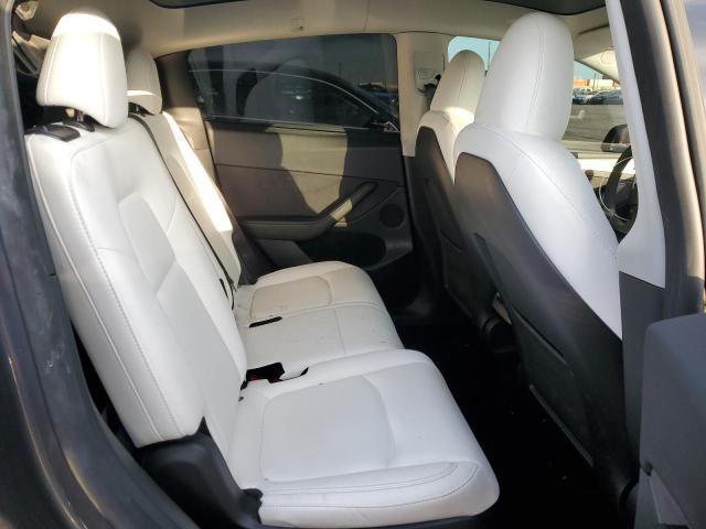 Photo 11 from auction – 2023 TESLA MODEL Y with VIN 7SAYGAEE2PF912152