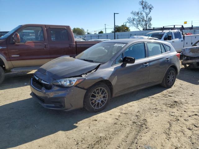 SUBARU IMPREZA 2018 with VIN 4S3GTAA68J3752138 - Photo from auction