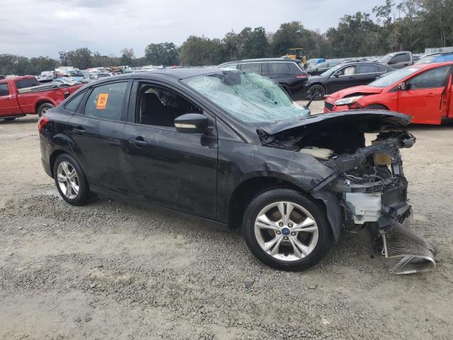 Photo 4 from auction – 2014 FORD FOCUS SE with VIN 1FADP3F23EL301140