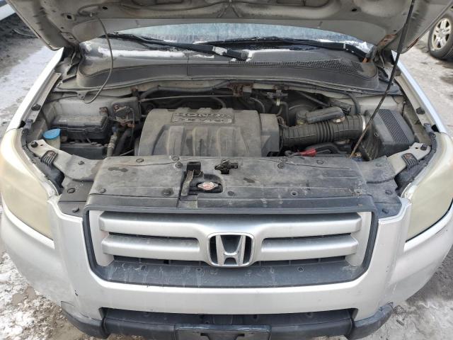 Photo 12 from auction – 2006 HONDA PILOT EX with VIN 2HKYF18576H514625