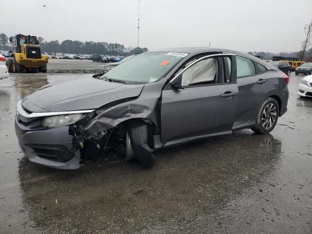 HONDA CIVIC EX 2017 with VIN 19XFC2F70HE018518 - Photo from auction