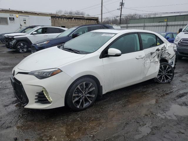 TOYOTA COROLLA L 2018 with VIN 2T1BURHEXJC013556 - Photo from auction