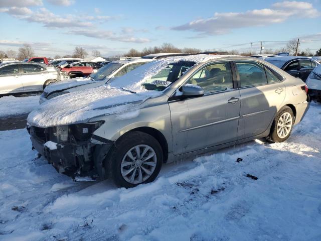 TOYOTA CAMRY LE 2017 with VIN 4T1BF1FK2HU679470 - Photo from auction