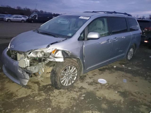 TOYOTA SIENNA XLE 2014 with VIN 5TDYK3DC1ES460520 - Photo from auction