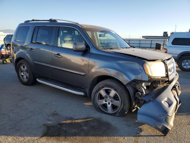 Снимка 4 от търг – 2011 HONDA PILOT EXLN с VIN 5FNYF3H72BB008965
