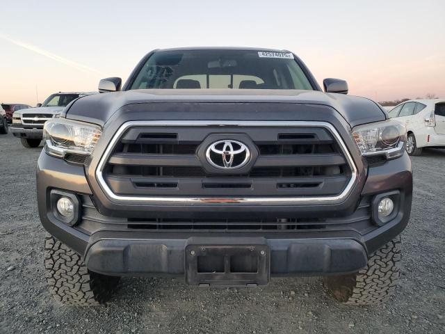 Photo 5 from auction – 2017 TOYOTA TACOMA DOU with VIN 3TMAZ5CN9HM030668