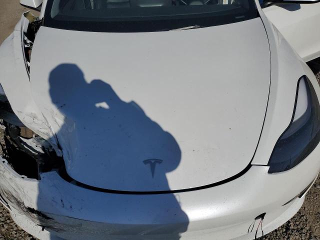 Photo 11 from auction – 2023 TESLA MODEL 3 with VIN 5YJ3E1EA7PF563497