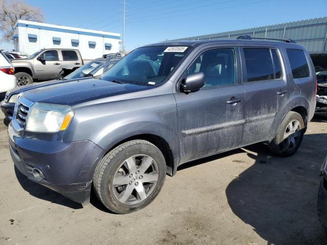 HONDA PILOT TOUR 2014 with VIN 5FNYF4H92EB052086 - Photo from auction