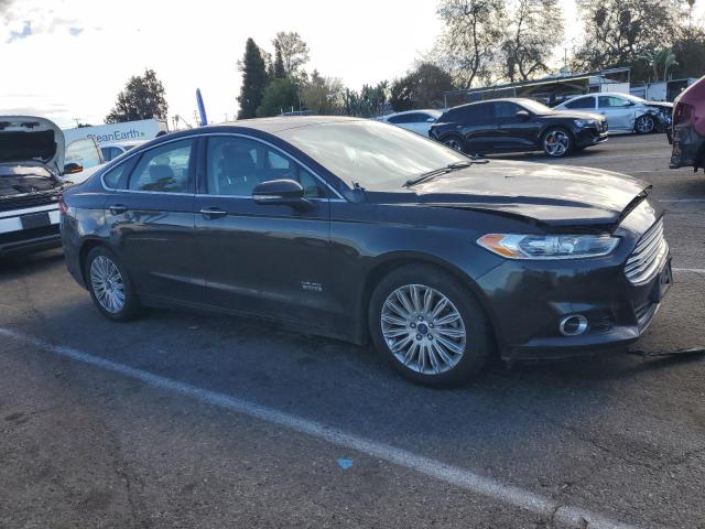 Photo 4 from auction – 2013 FORD FUSION ENE with VIN 3FA6P0SU0DR299958