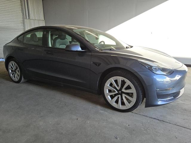 Photo 4 from auction – 2022 TESLA MODEL 3 with VIN 5YJ3E1EA0NF290271