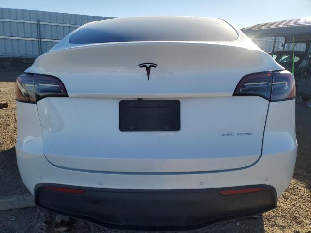 Снимка 6 от търг – 2021 TESLA MODEL Y с VIN 5YJYGDEE4MF276117