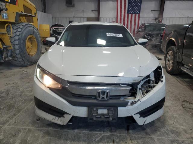 Photo 5 from auction – 2017 HONDA CIVIC EX with VIN 19XFC2F79HE006349