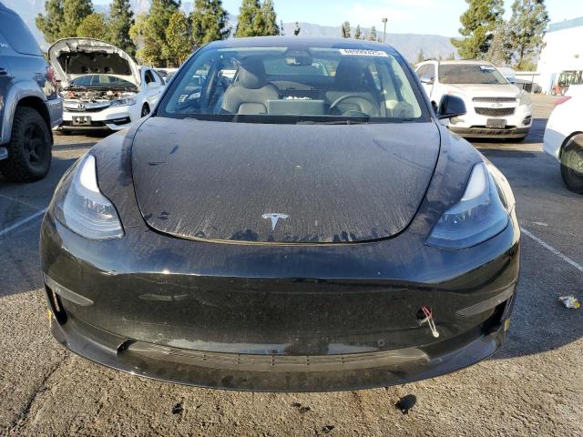 Photo 5 from auction – 2022 TESLA MODEL 3 with VIN 5YJ3E1EB9NF131421