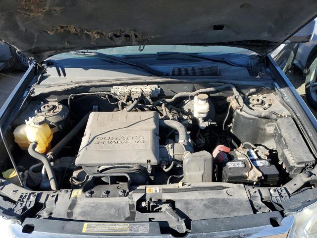Photo 11 from auction – 2009 FORD ESCAPE LIM with VIN 1FMCU94G29KA60744