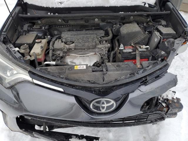 Photo 12 from auction – 2018 TOYOTA RAV4 LE with VIN JTMBFREV7JJ212857