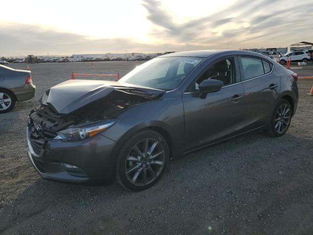 MAZDA 3 TOURING 2018 with VIN 3MZBN1V30JM246156 - Photo from auction