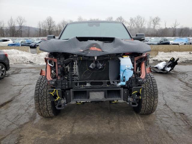 Photo 5 from auction – 2024 RAM 1500 TRX with VIN 1C6SRFU99RN201462