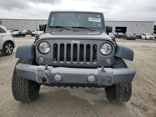 Photo 5 from auction – 2016 JEEP WRANGLER U with VIN 1C4BJWDG9GL338201