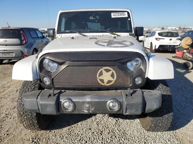Photo 5 from auction – 2015 JEEP WRANGLER U with VIN 1C4HJWDG2FL614713