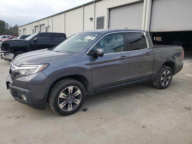 HONDA RIDGELINE 2017 with VIN 5FPYK2F61HB011324 - Photo from auction