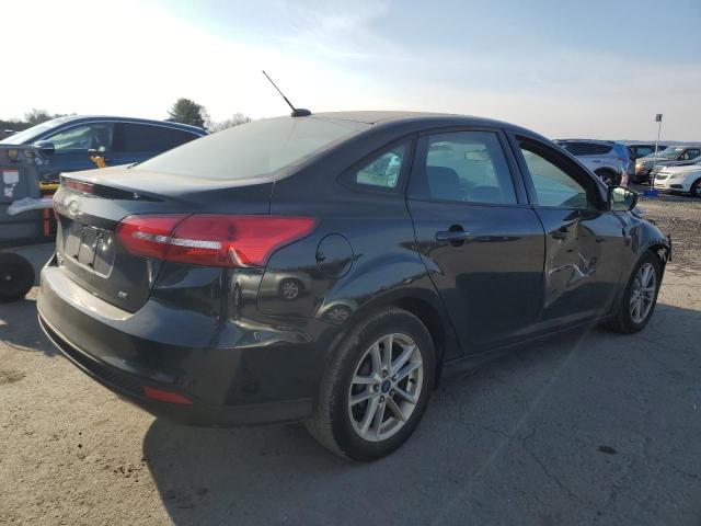 Photo 3 from auction – 2017 FORD FOCUS SE with VIN 1FADP3F23HL261923