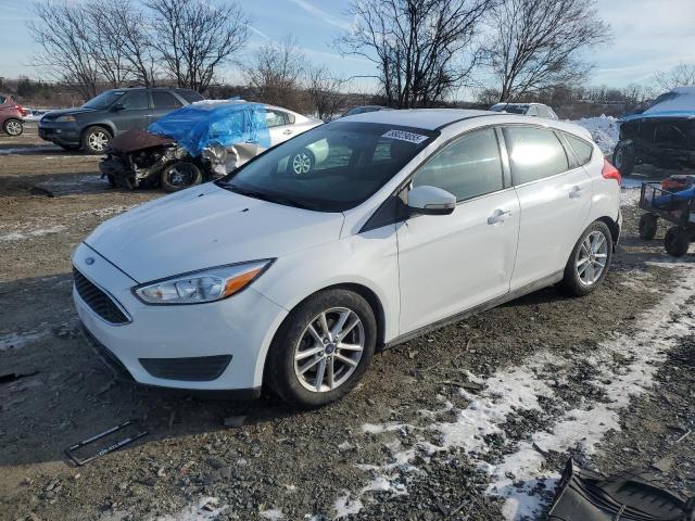 FORD FOCUS SE 2015 with VIN 1FADP3K20FL289553 - Photo from auction