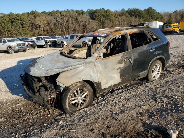 KIA SORENTO LX 2014 with VIN 5XYKT3A61EG507799 - Photo from auction