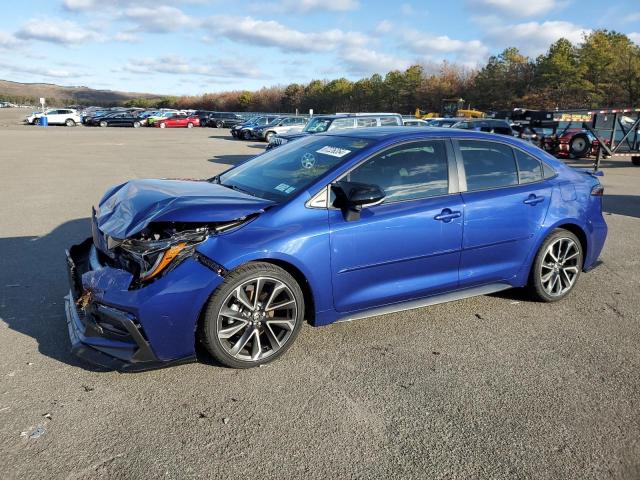 TOYOTA COROLLA SE 2022 with VIN JTDP4MCE8NJ089822 - Photo from auction