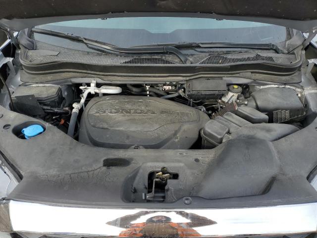 Photo 11 from auction – 2022 HONDA PASSPORT E with VIN 5FNYF8H52NB021277