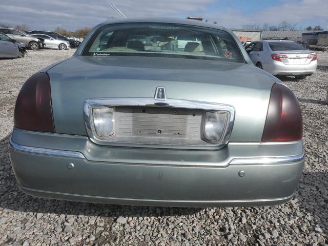Photo 6 from auction – 2004 LINCOLN TOWN CAR E with VIN 1LNHM81W04Y626028