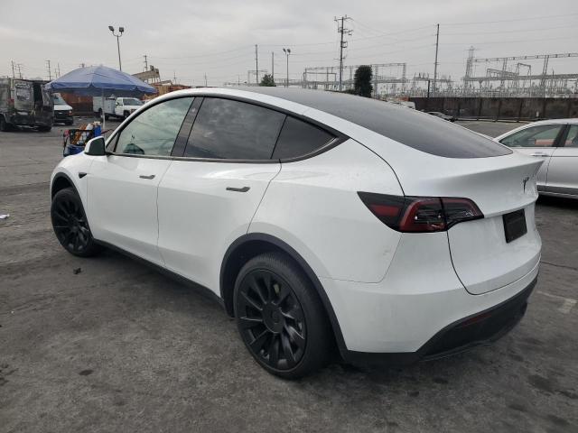 Photo 2 from auction – 2023 TESLA MODEL Y with VIN 7SAYGDEE1PA033837