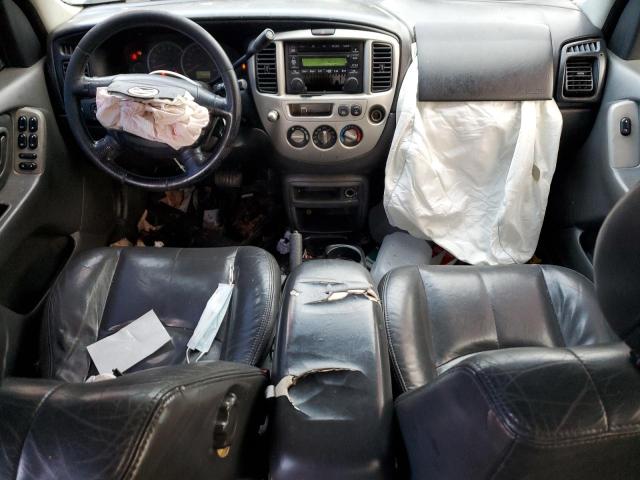 Photo 8 from auction – 2004 MAZDA TRIBUTE ES with VIN 4F2CZ96104KM09777