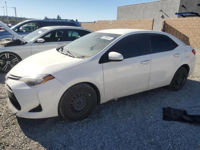 TOYOTA COROLLA L 2017 with VIN 5YFBURHE4HP702292 - Photo from auction