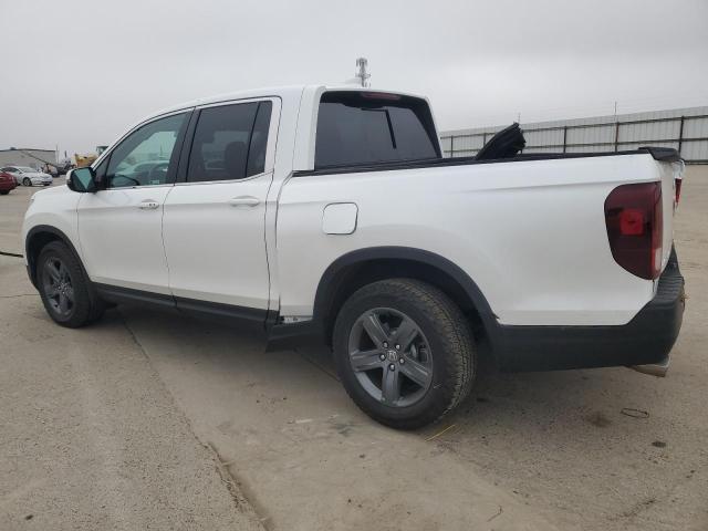 Photo 2 from auction – 2023 HONDA RIDGELINE with VIN 5FPYK3F59PB013835