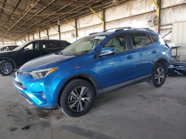 TOYOTA RAV4 XLE 2016 with VIN JTMWFREV4GJ062992 - Photo from auction