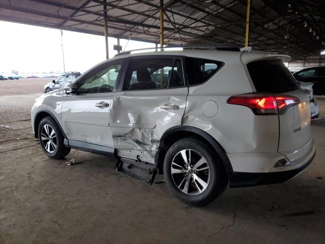 Photo 2 from auction – 2017 TOYOTA RAV4 XLE with VIN JTMWFREV5HD107387