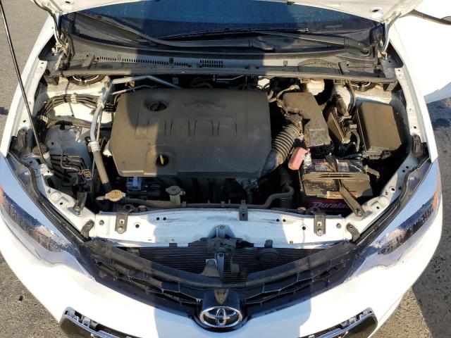 Photo 11 from auction – 2014 TOYOTA COROLLA L with VIN 5YFBURHE8EP115895