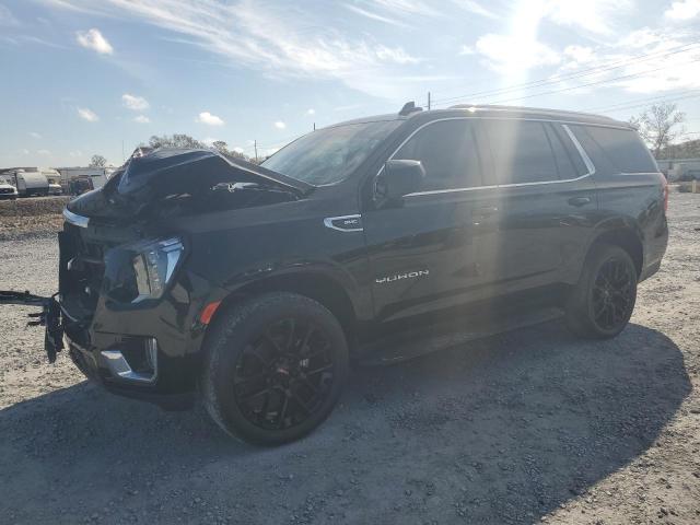 GMC YUKON SLE 2022 with VIN 1GKS1AKD3NR327219 - Photo from auction