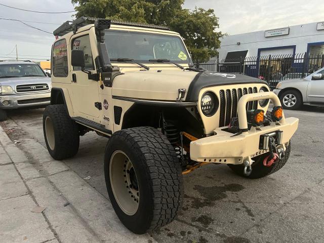 JEEP WRANGLER / 2000 with VIN 1J4FA59S5YP767350 - Photo from auction