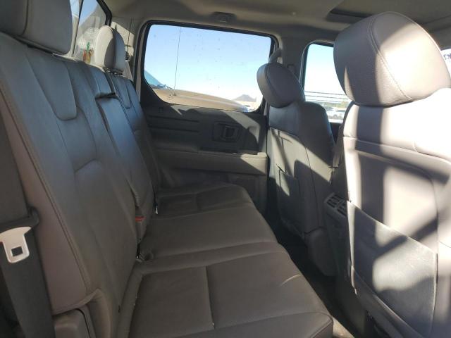 Photo 10 from auction – 2014 HONDA RIDGELINE with VIN 5FPYK1F51EB011627