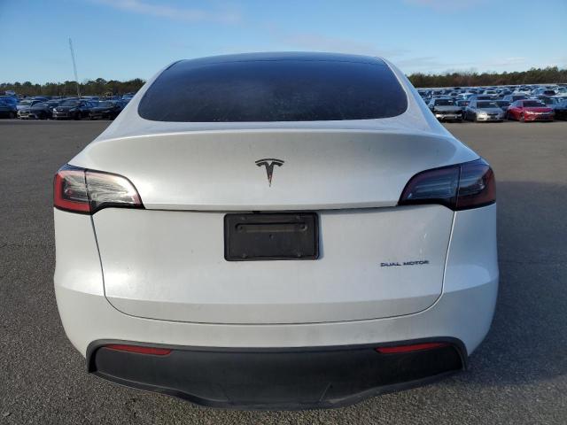 Photo 6 from auction – 2023 TESLA MODEL Y with VIN 7SAYGDEE6PA125140