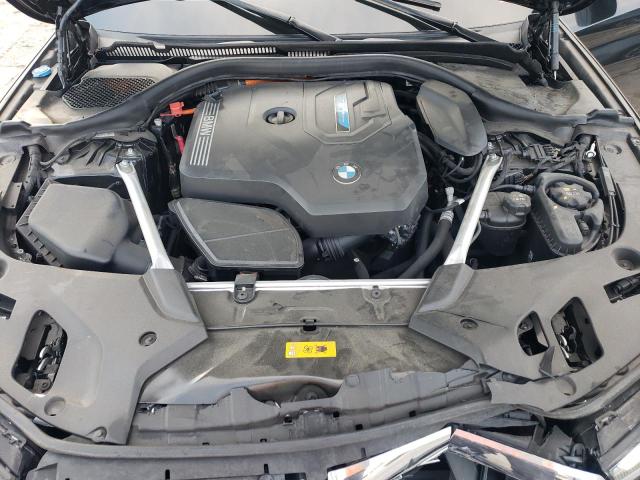 Photo 11 from auction – 2023 BMW 530E with VIN WBA13AG05PCM62258