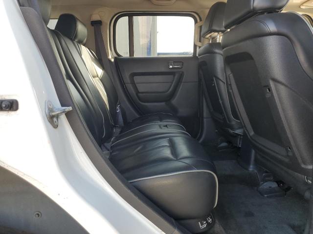 Photo 11 from auction – 2006 HUMMER H3 with VIN 5GTDN136568288030