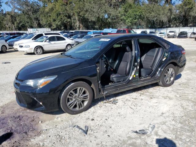 TOYOTA CAMRY LE 2017 with VIN 4T1BF1FKXHU619839 - Photo from auction