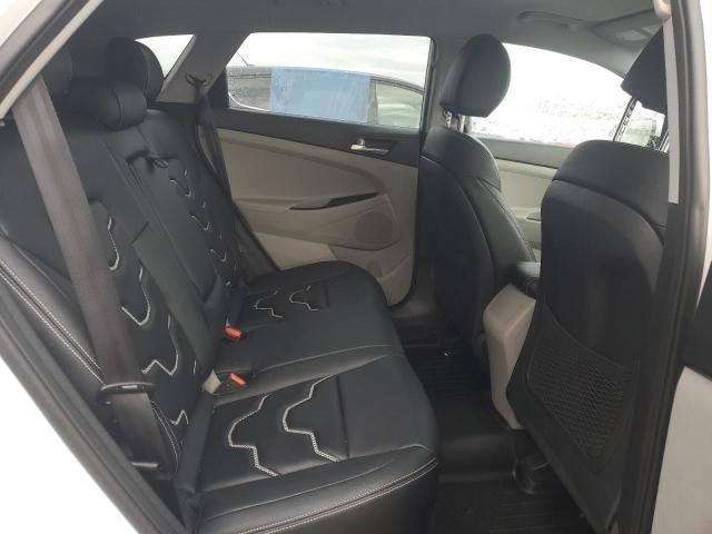 Photo 11 from auction – 2020 HYUNDAI TUCSON SE with VIN KM8J2CA40LU108970