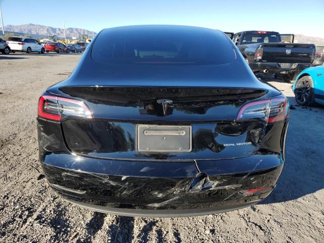 Photo 6 from auction – 2022 TESLA MODEL 3 with VIN 5YJ3E1EBXNF119214