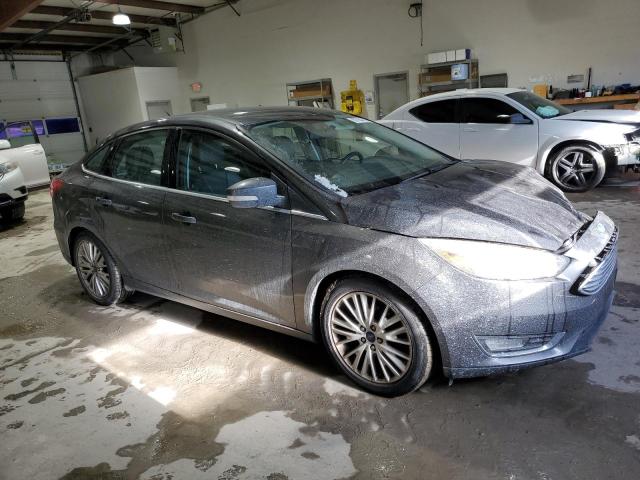 Photo 4 from auction – 2015 FORD FOCUS TITA with VIN 1FADP3J22FL277793