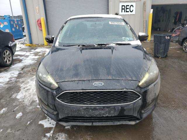 Photo 5 from auction – 2015 FORD FOCUS SE with VIN 1FADP3K24FL319542